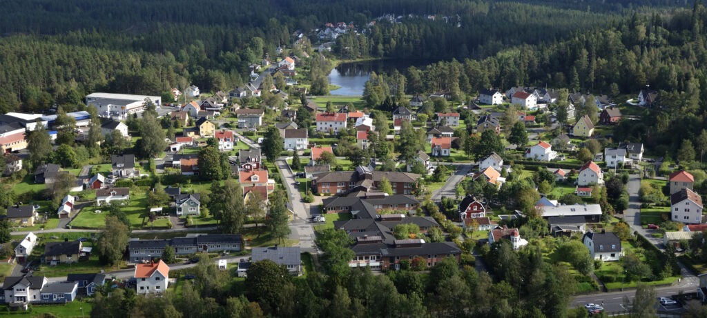 Bird wiew over small town neighbourhood close to nature. Real estate close to nature with clean air. Unique bird view concept.